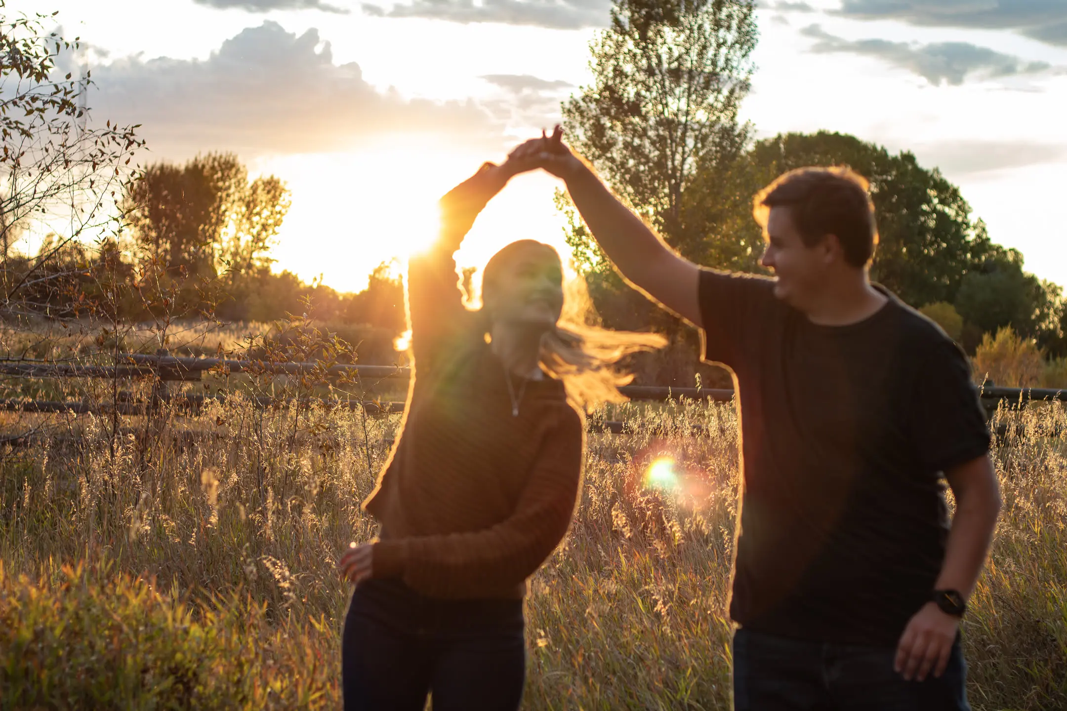 jacob hofer and makenna howard engagement dancing in the sunset